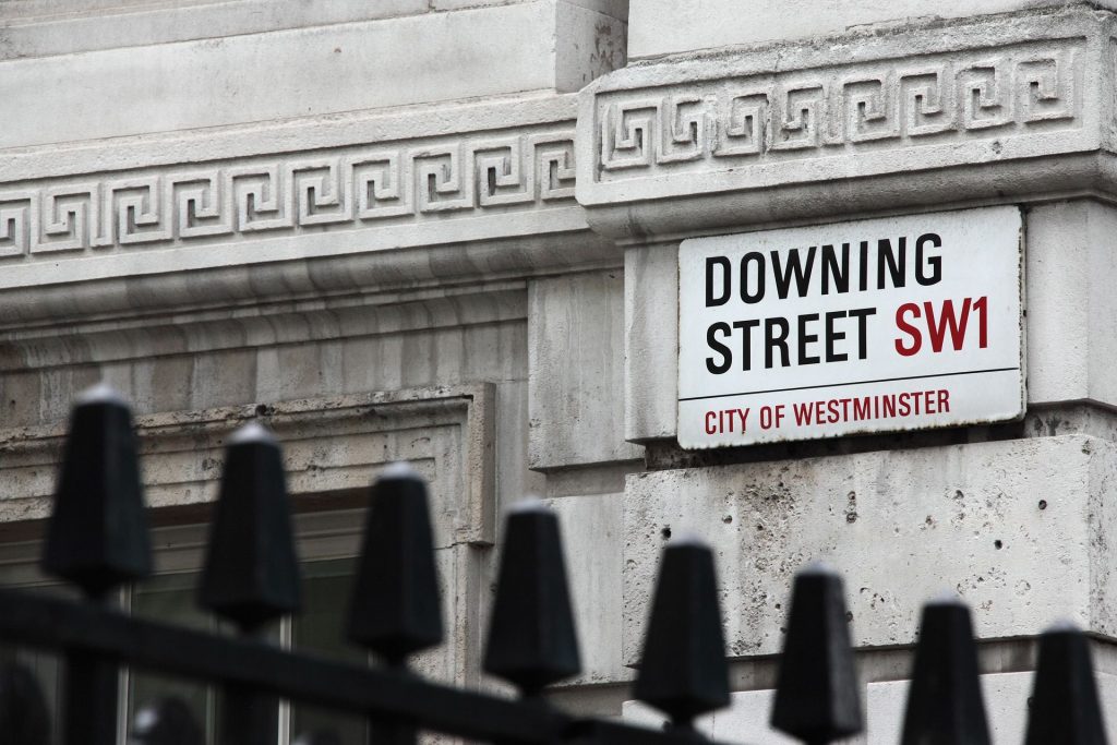 Close up of downing street showing the sign